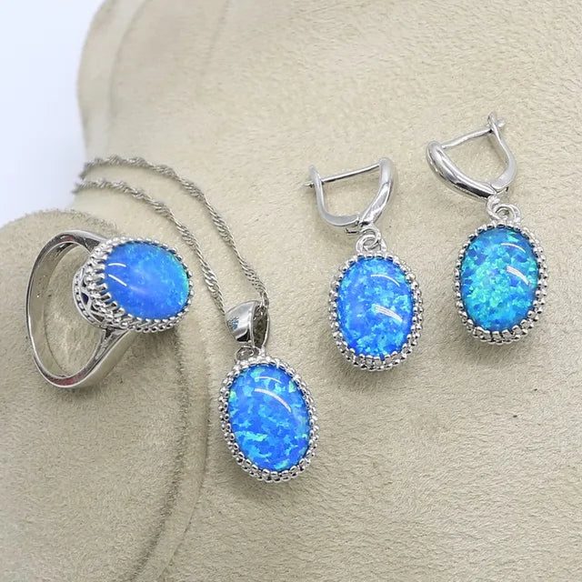 Iridescent Opulence: Opal Silver Jewelry Set - 925 Sterling Silver Ring, Earrings, and Pendant