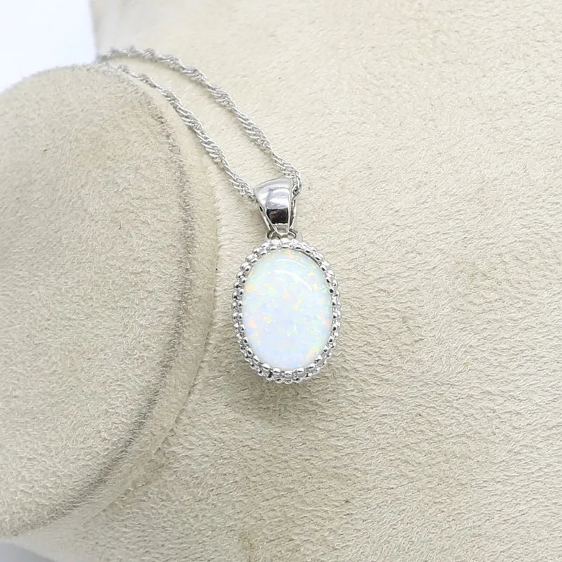 Iridescent Opulence: Opal Silver Jewelry Set - 925 Sterling Silver Ring, Earrings, and Pendant